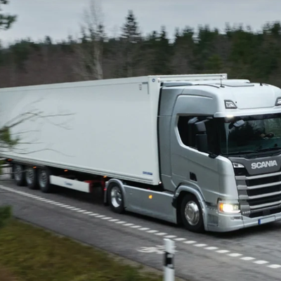 Scania articulated lorry transporting goods on an Irish countryside road — commercial haulage and logistics truck in Ireland.