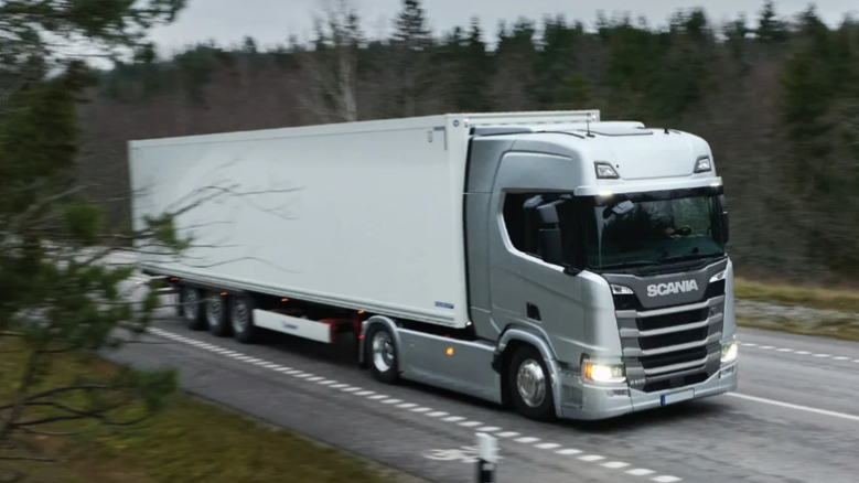 Scania articulated lorry transporting goods on an Irish countryside road — commercial haulage and logistics truck in Ireland.