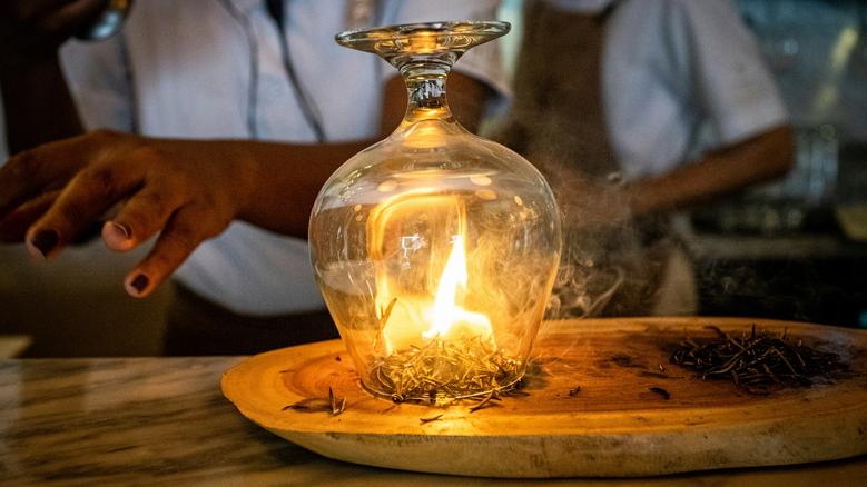 glass with burning inside