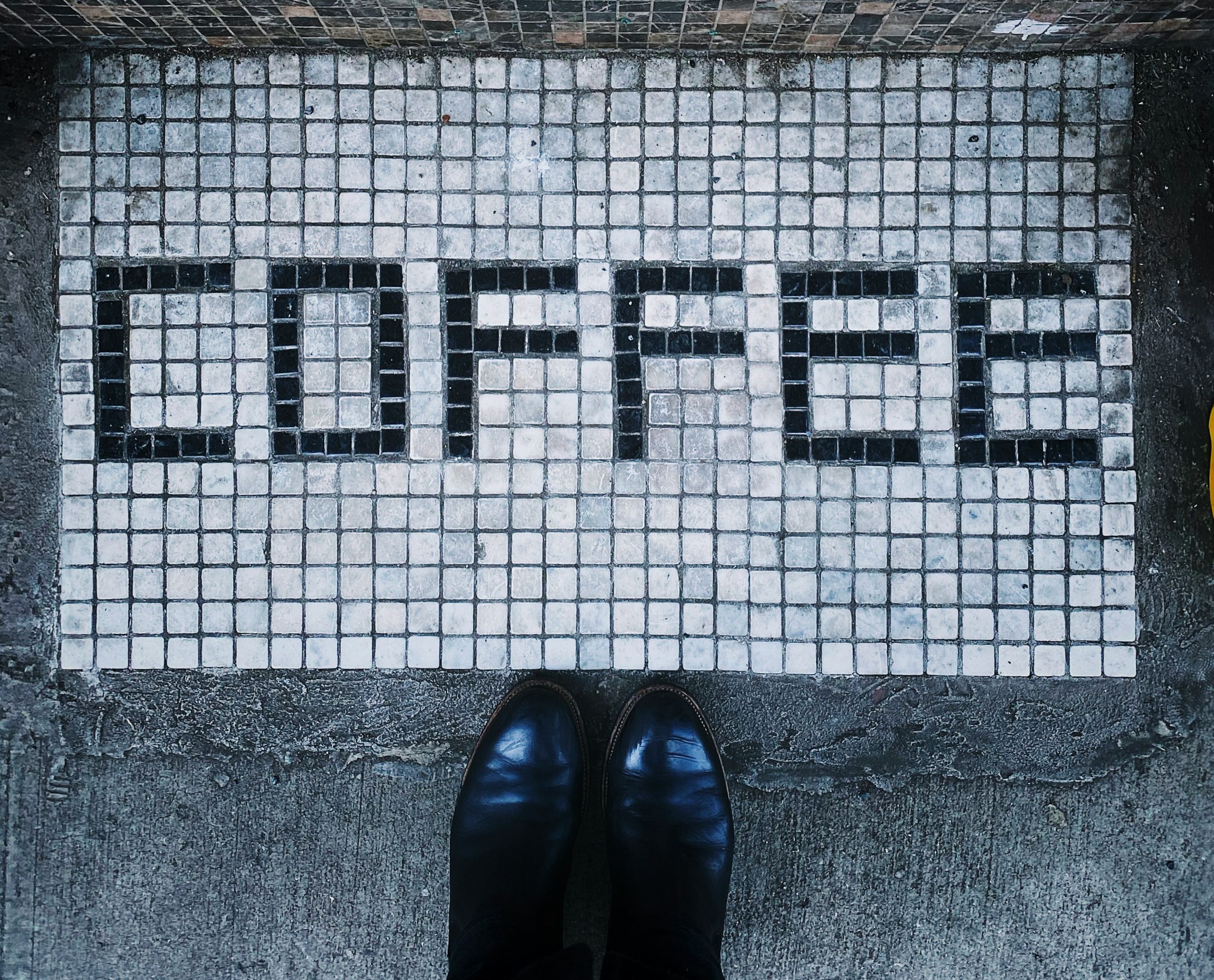 feet and a coffee mat
