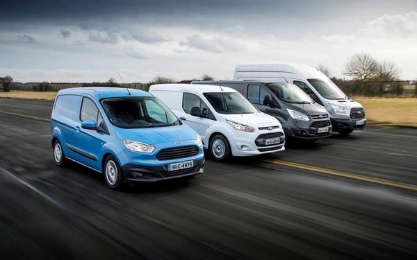 leet of Ford Transit vans driving on an Irish road — commercial vehicles for business delivery, logistics, and van finance in Ireland