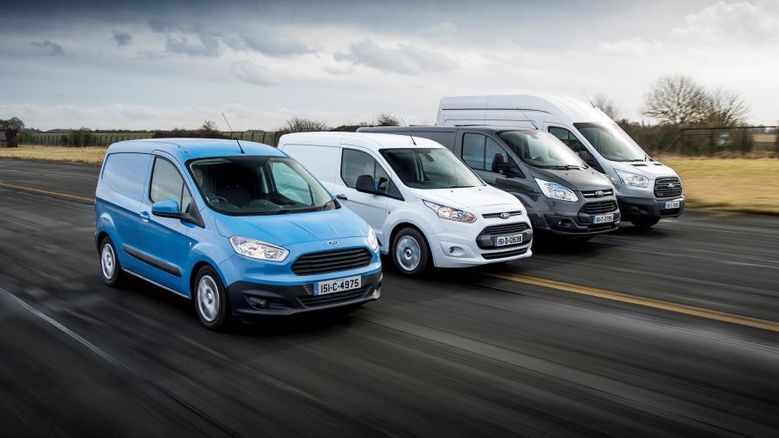 leet of Ford Transit vans driving on an Irish road — commercial vehicles for business delivery, logistics, and van finance in Ireland