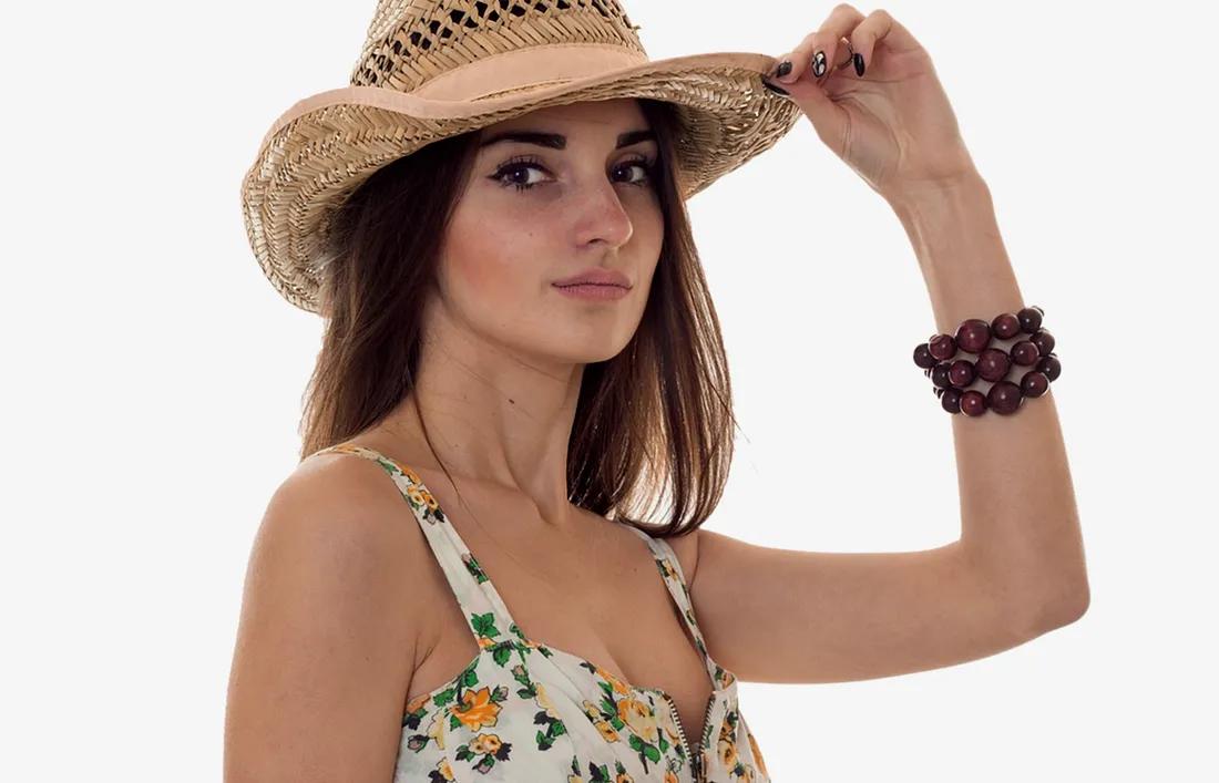 A girl wearing a cap to Protect Her Hair from the Sun