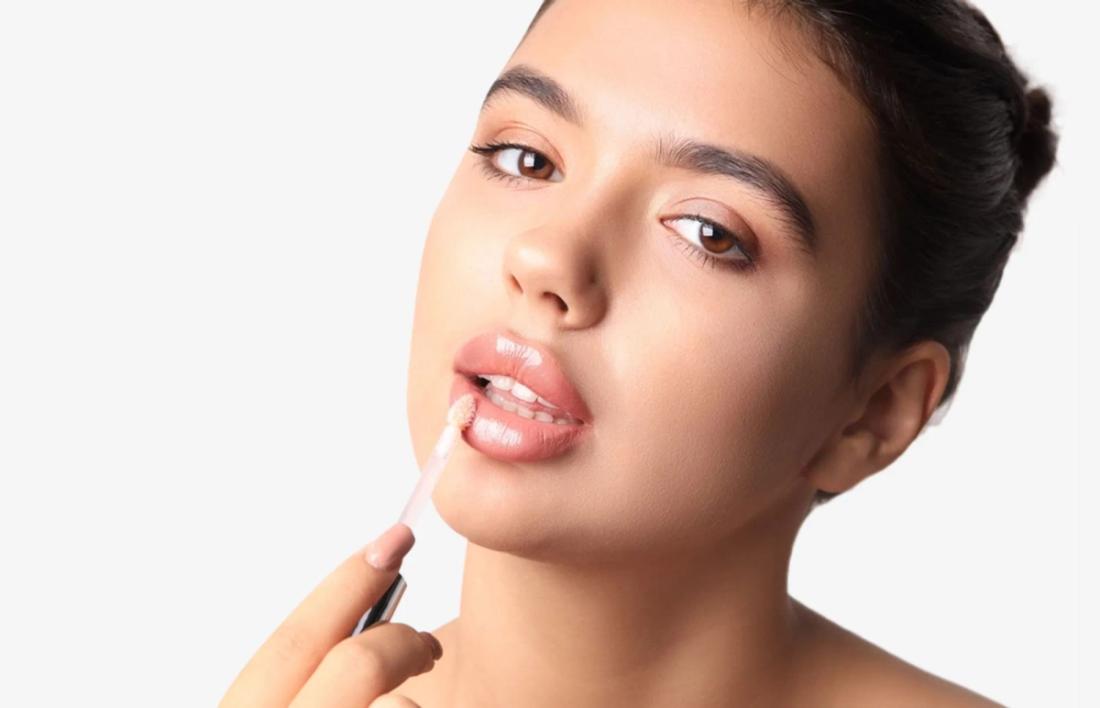 A woman setting her lips
