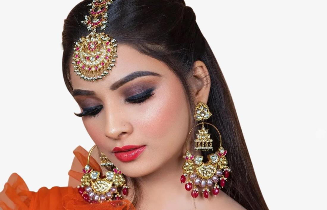 A woman in full makeup