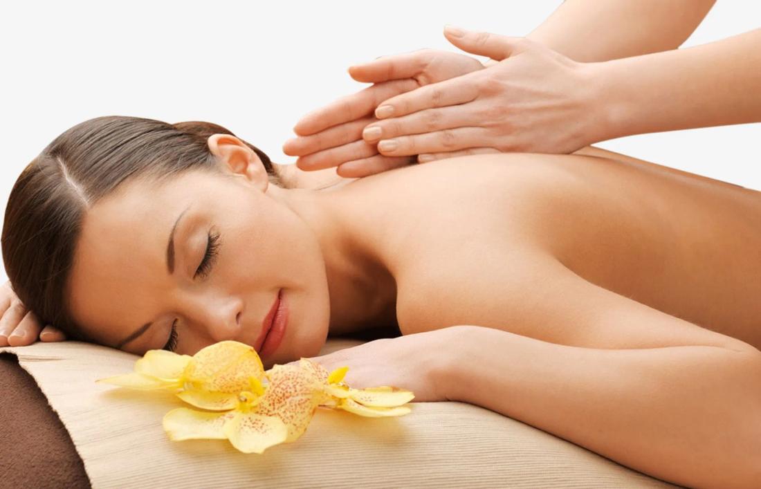 A woman getting back massage using Friction Techniques