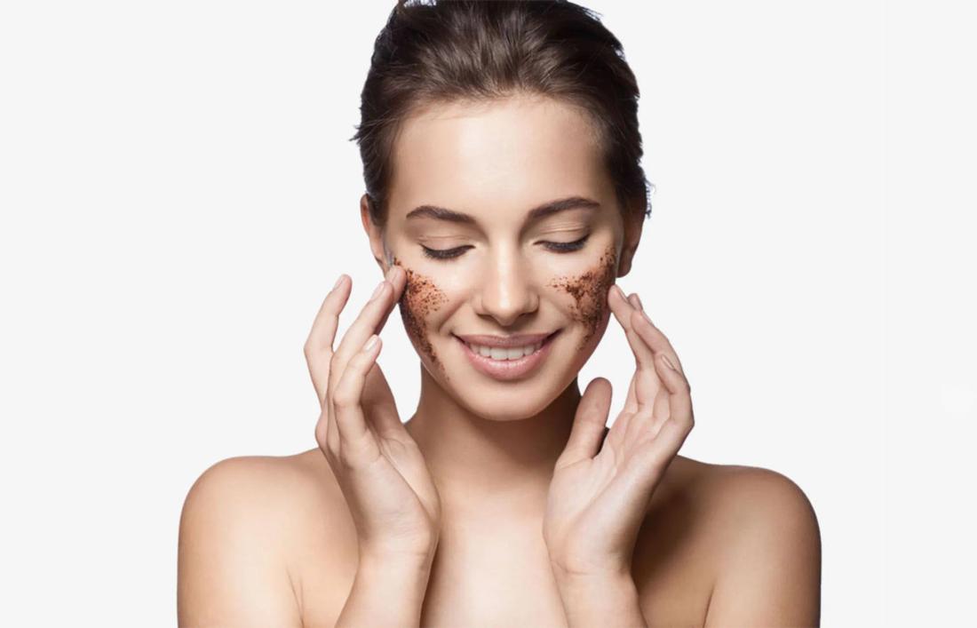 A woman Exfoliating her skin