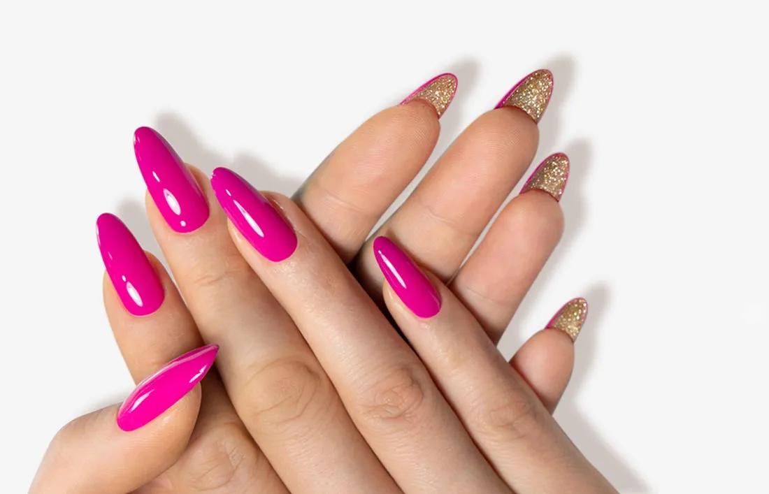 A woman giving Finishing touches to nail extension