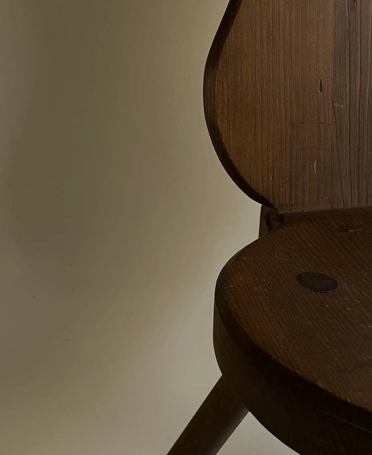 Brutalist wooden three legged chair, view 6