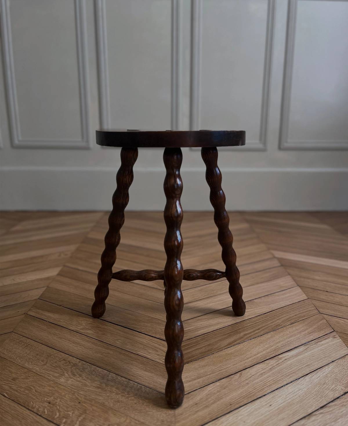 Brutalist turned legs tripod stool, c.1930