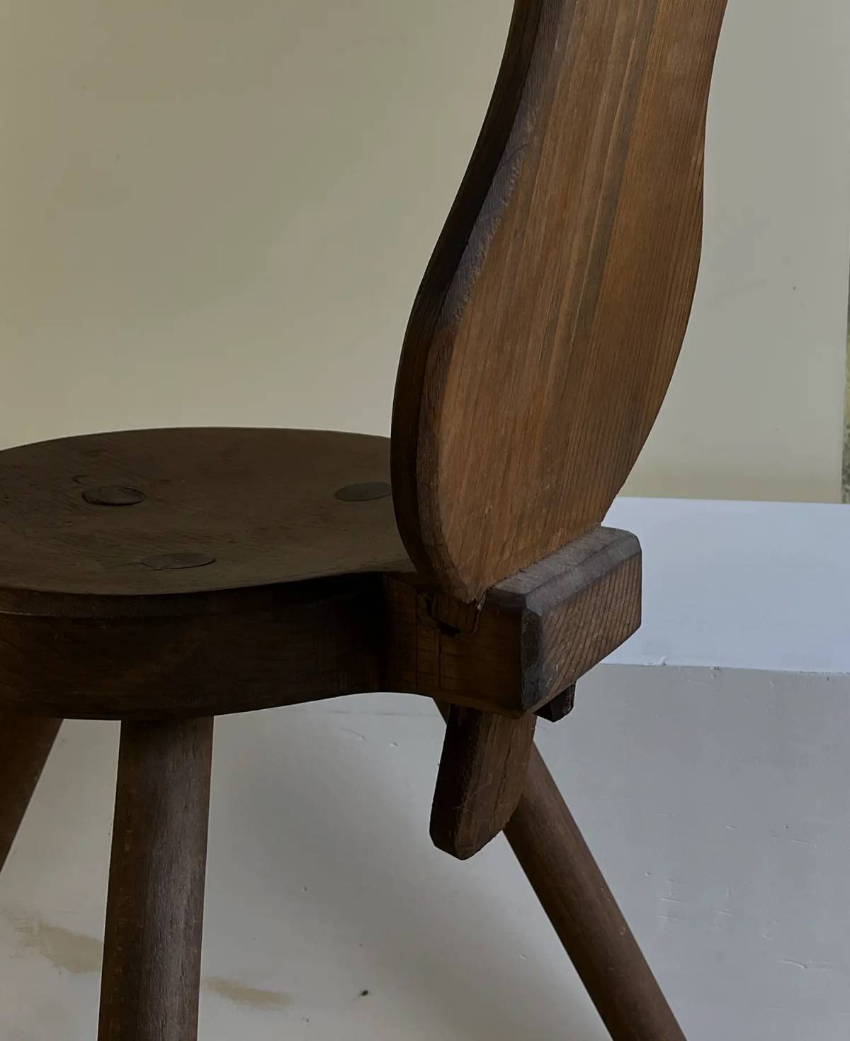 Brutalist wooden three legged chair