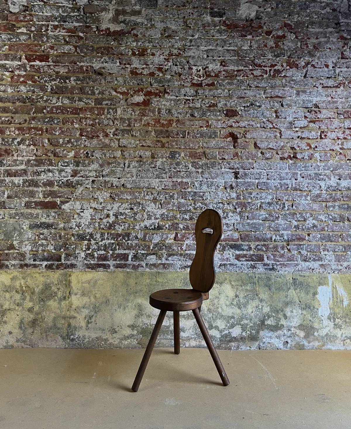 Brutalist wooden three legged chair, view 2
