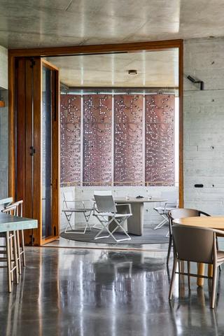 4 gang switch in matte black set flush in concrete