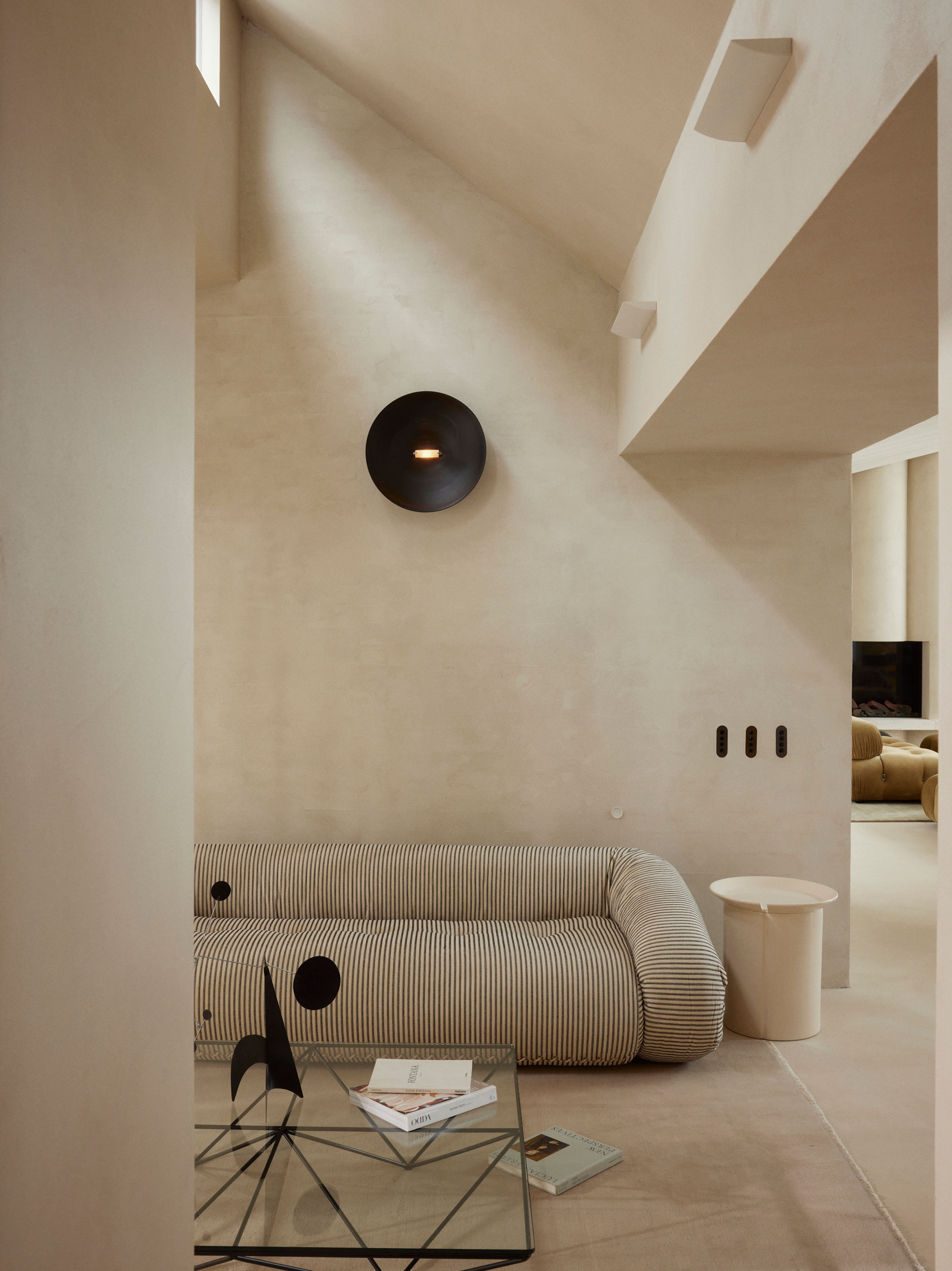 Light pours through architectural home showcasing ZETR flush switch grids in a set of three