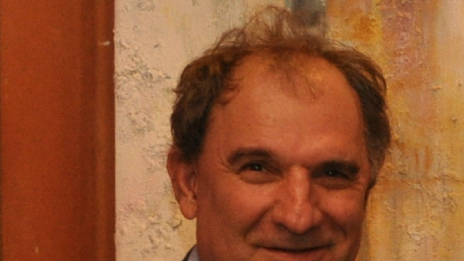 O locutor esportivo Osmar Santos sorrindo, em foto de 2010.
