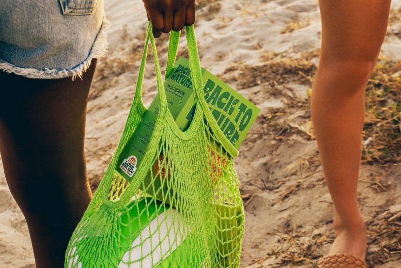 A bag of beach gear, including back to nature crackers