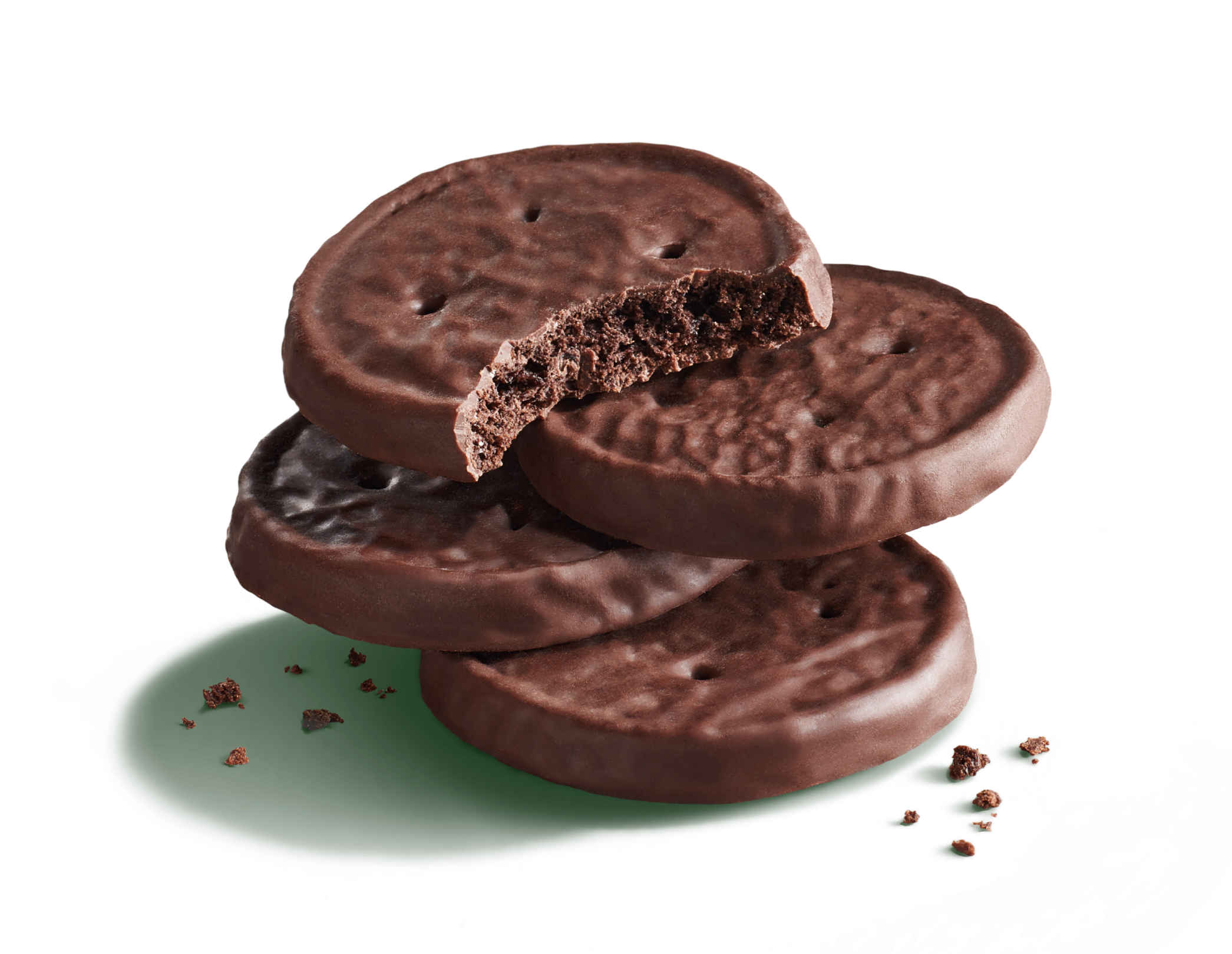 Four stacked Fudge Mint Cookies with fudgy crumbs, one cookie is bitten