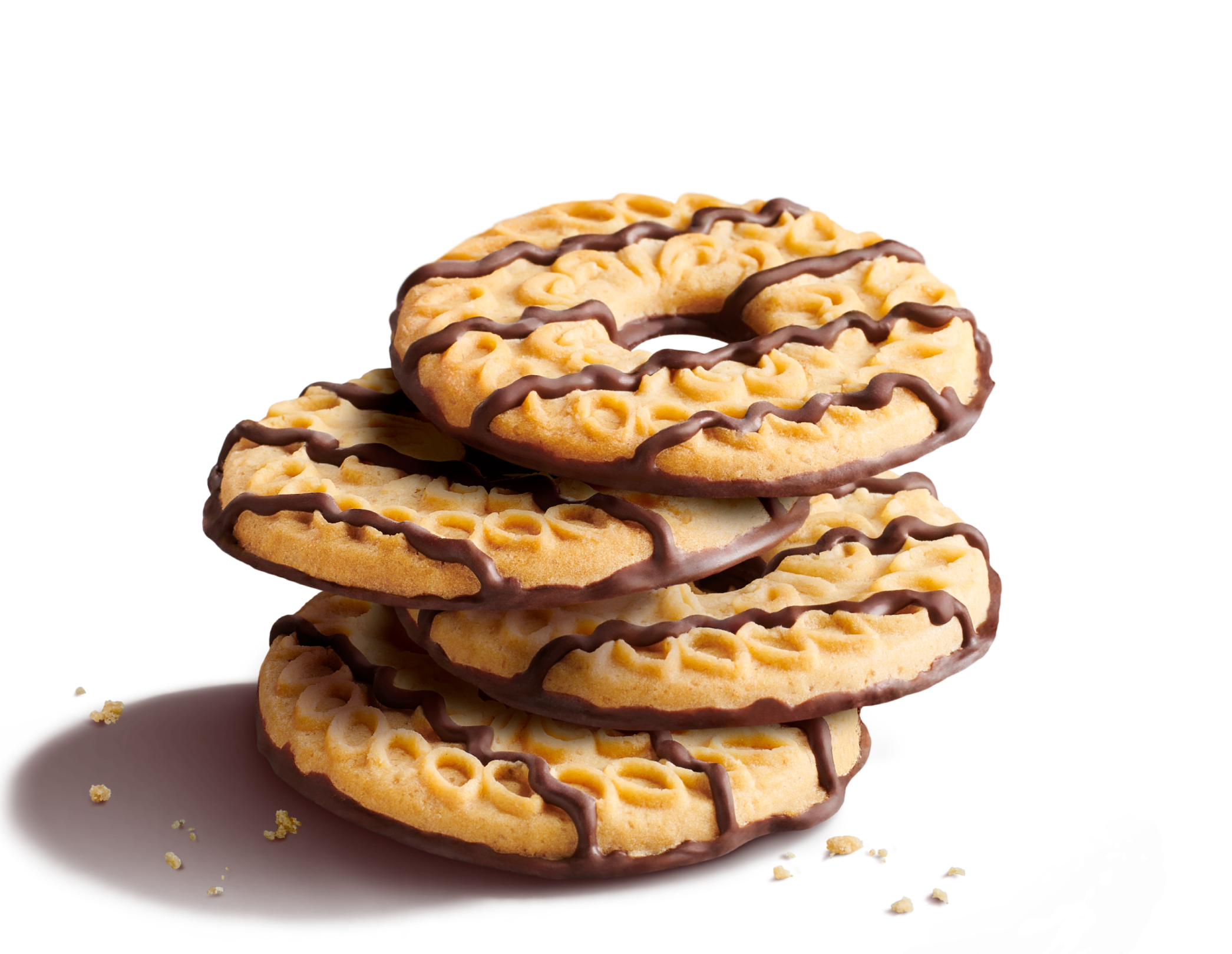 Four stacked Fudge Striped Cookies with cookie crumbs