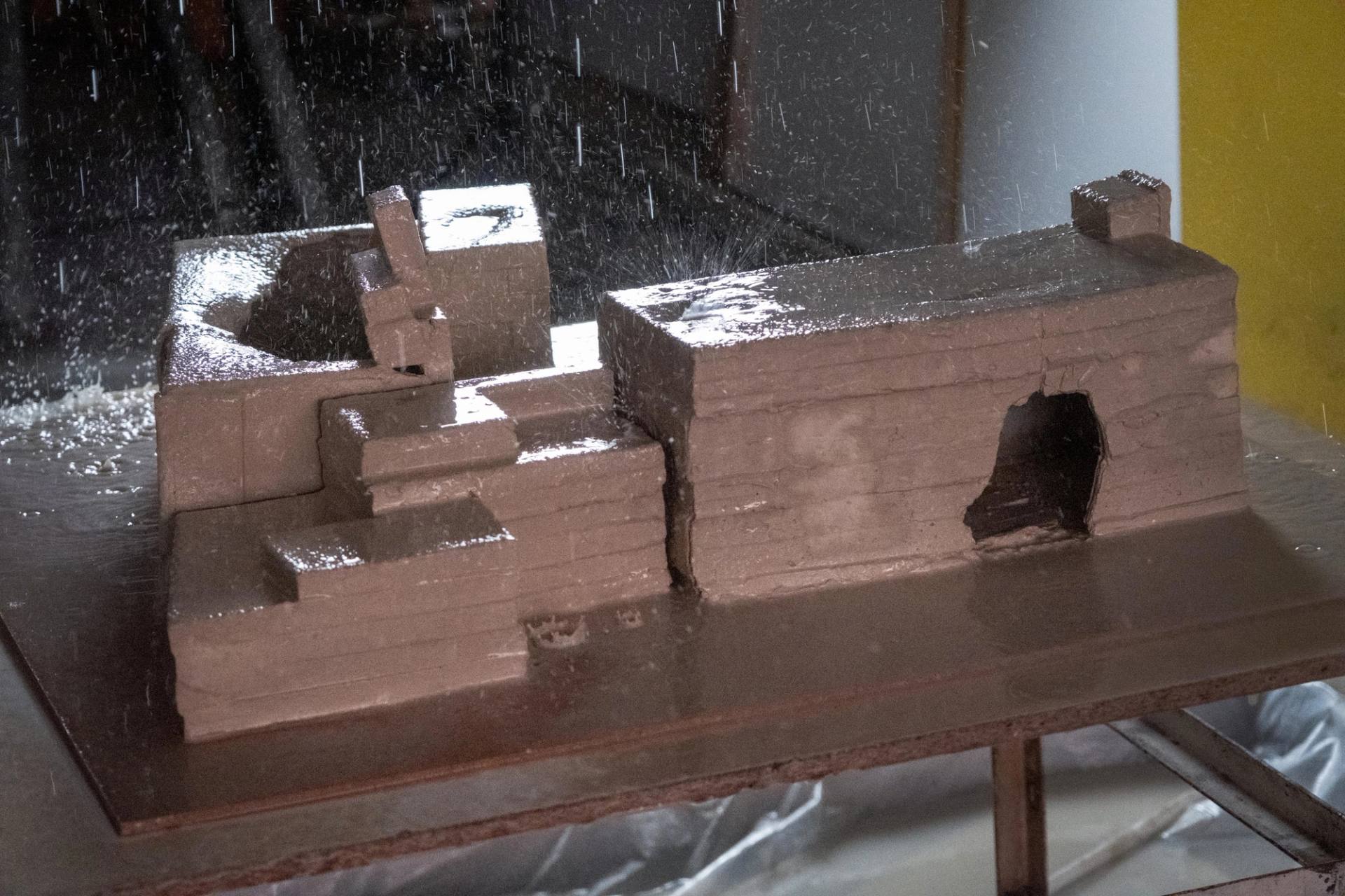 a destroyed building in clay