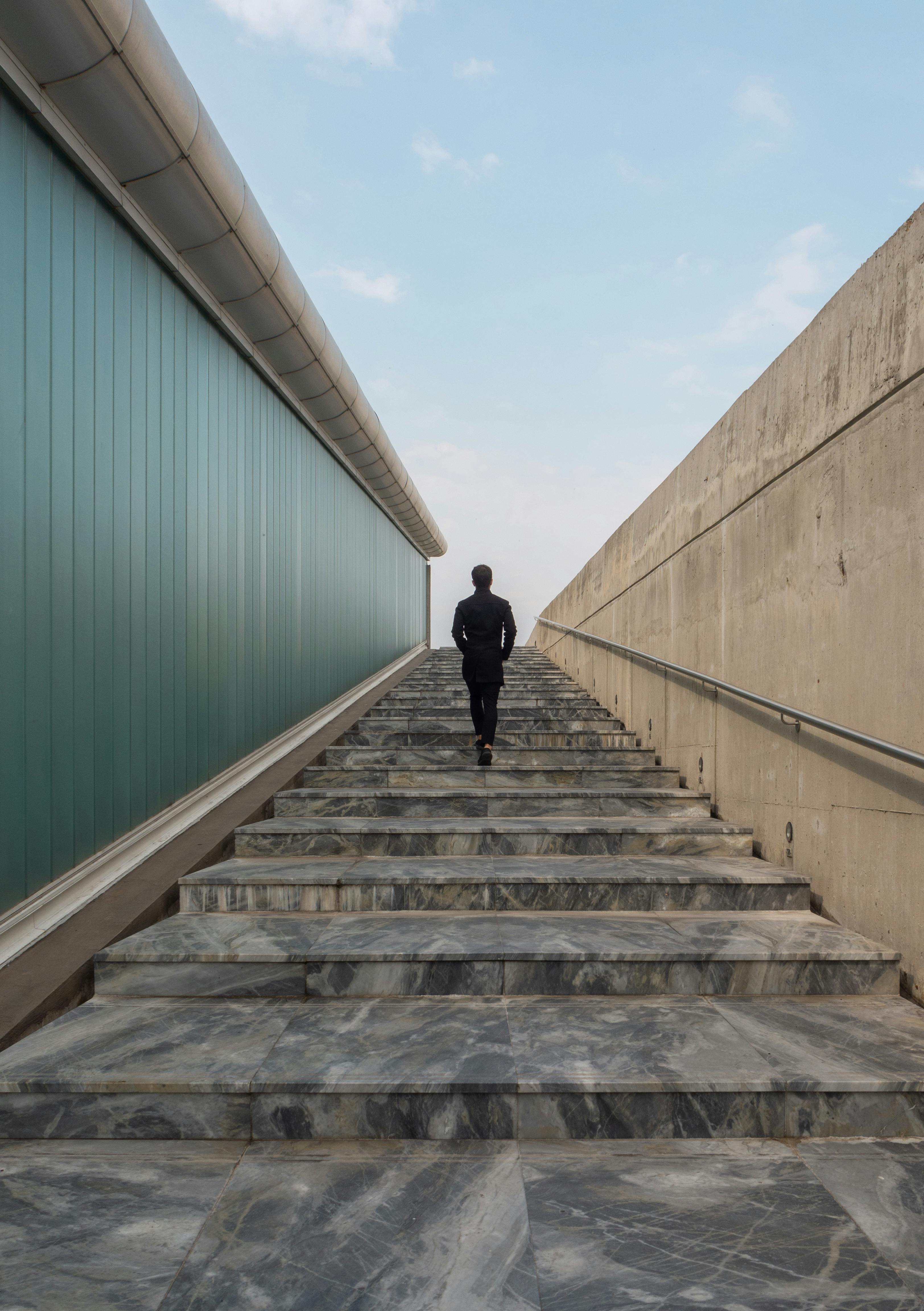 A man going up the stairs
