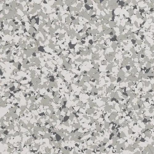 A color sample with small white, gray, and dark gray speckles