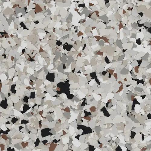 A color sample with black, gray, white, and brown speckles