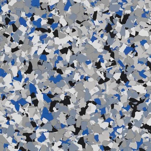 A color sample with black, gray, white, and blue speckles