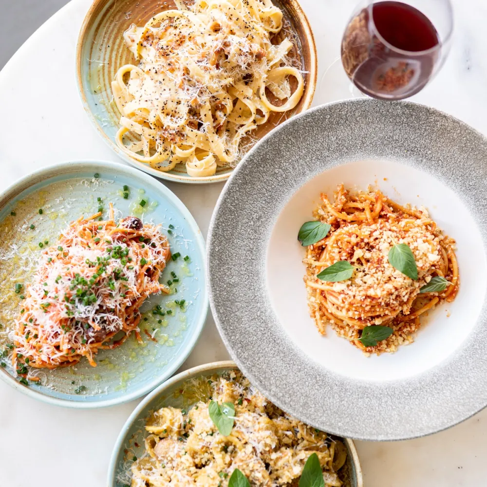 Amici Pasta bowls and wine