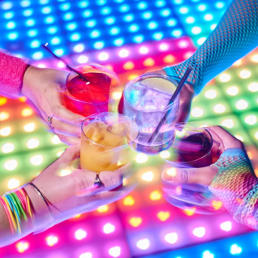 cocktails over light up dance floor at 88mph