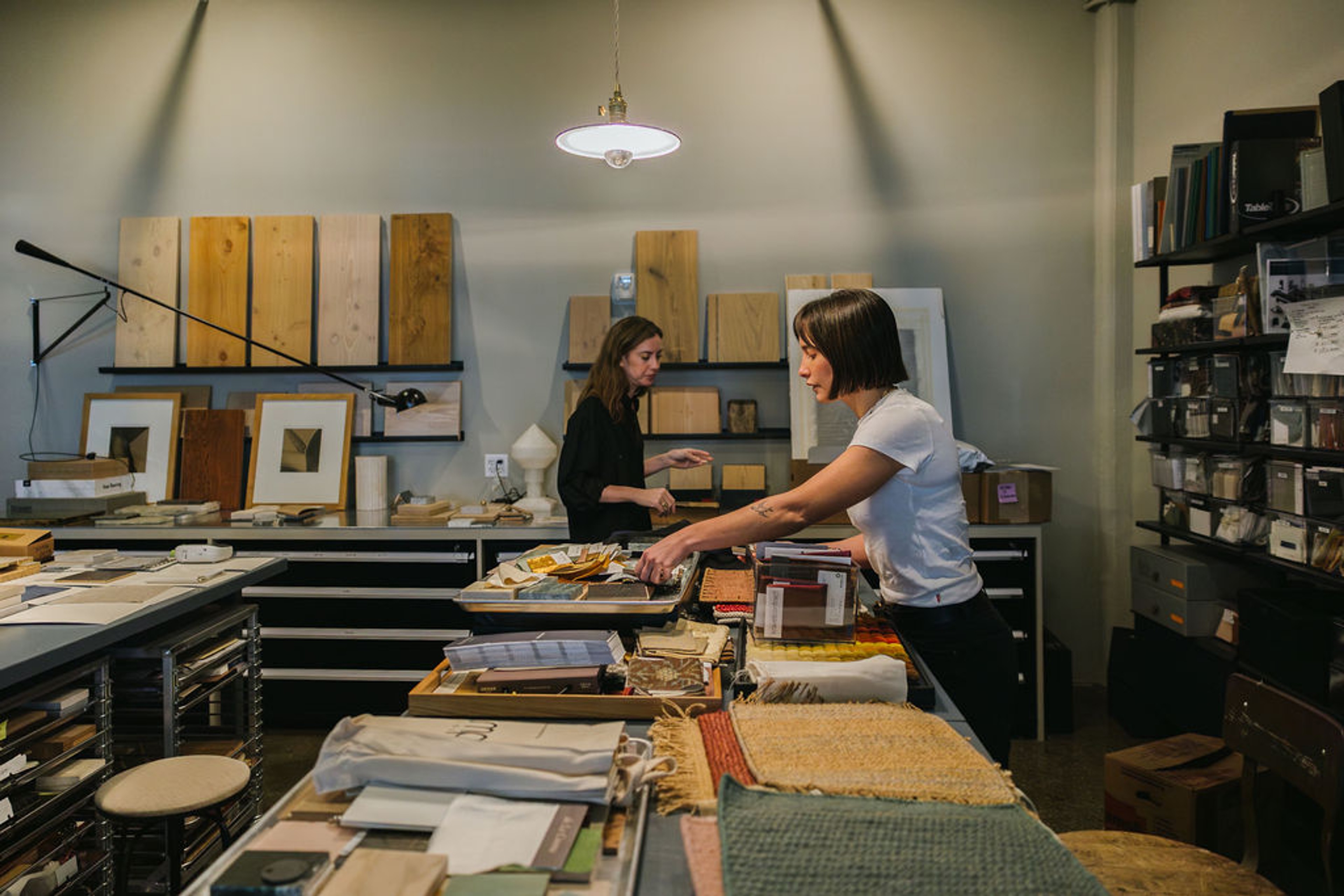 Designers reviewing materials in office