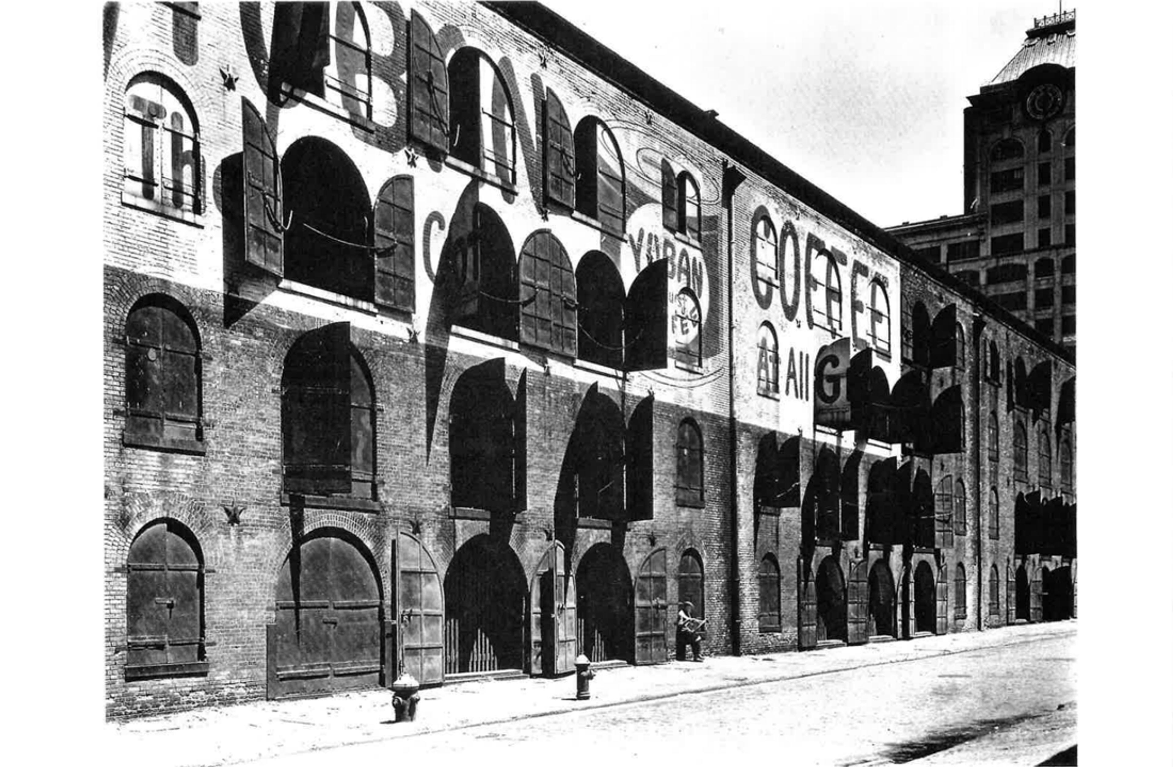 Black and white historical image of Empire Stores Building