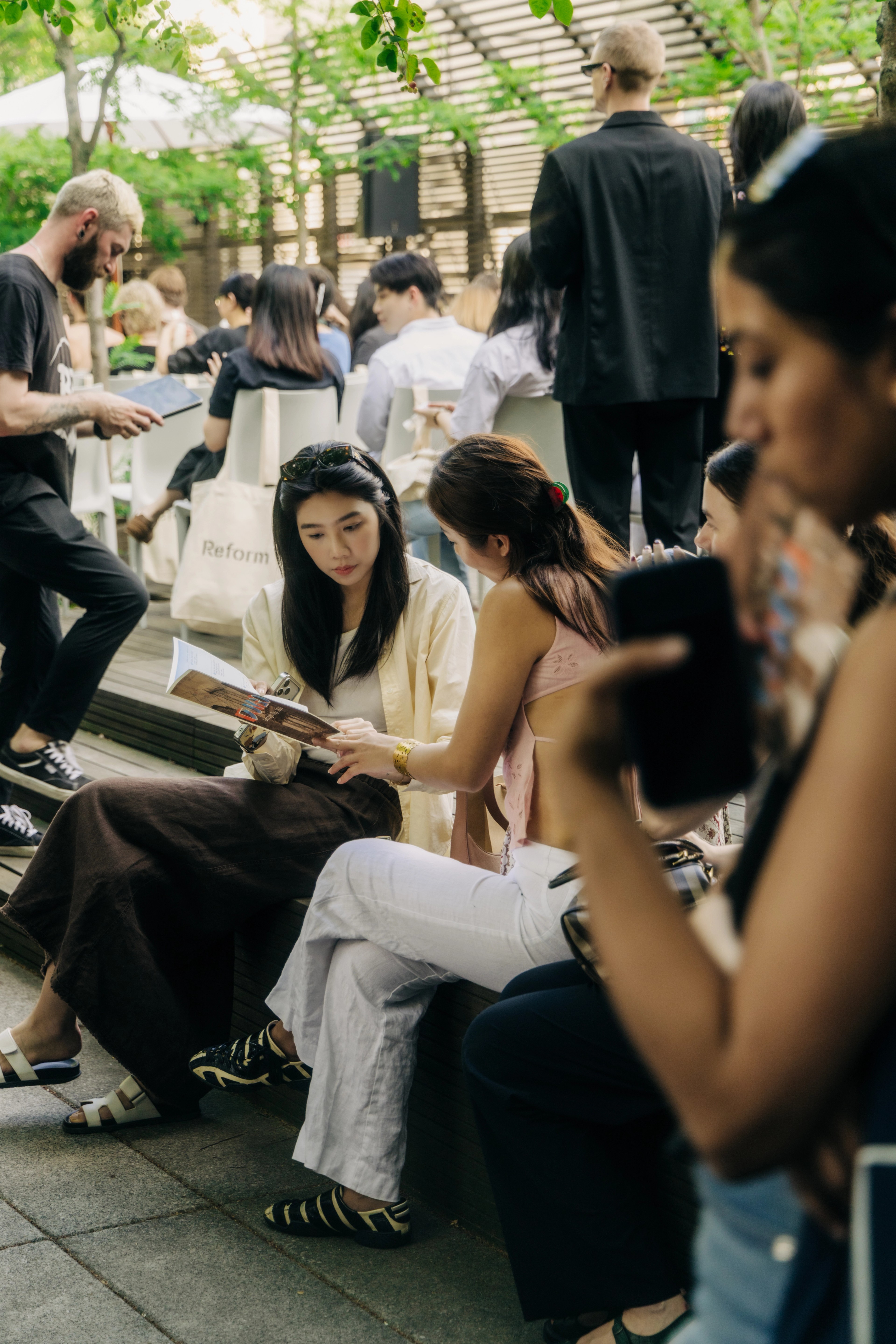 People seated at rooftop design talk
