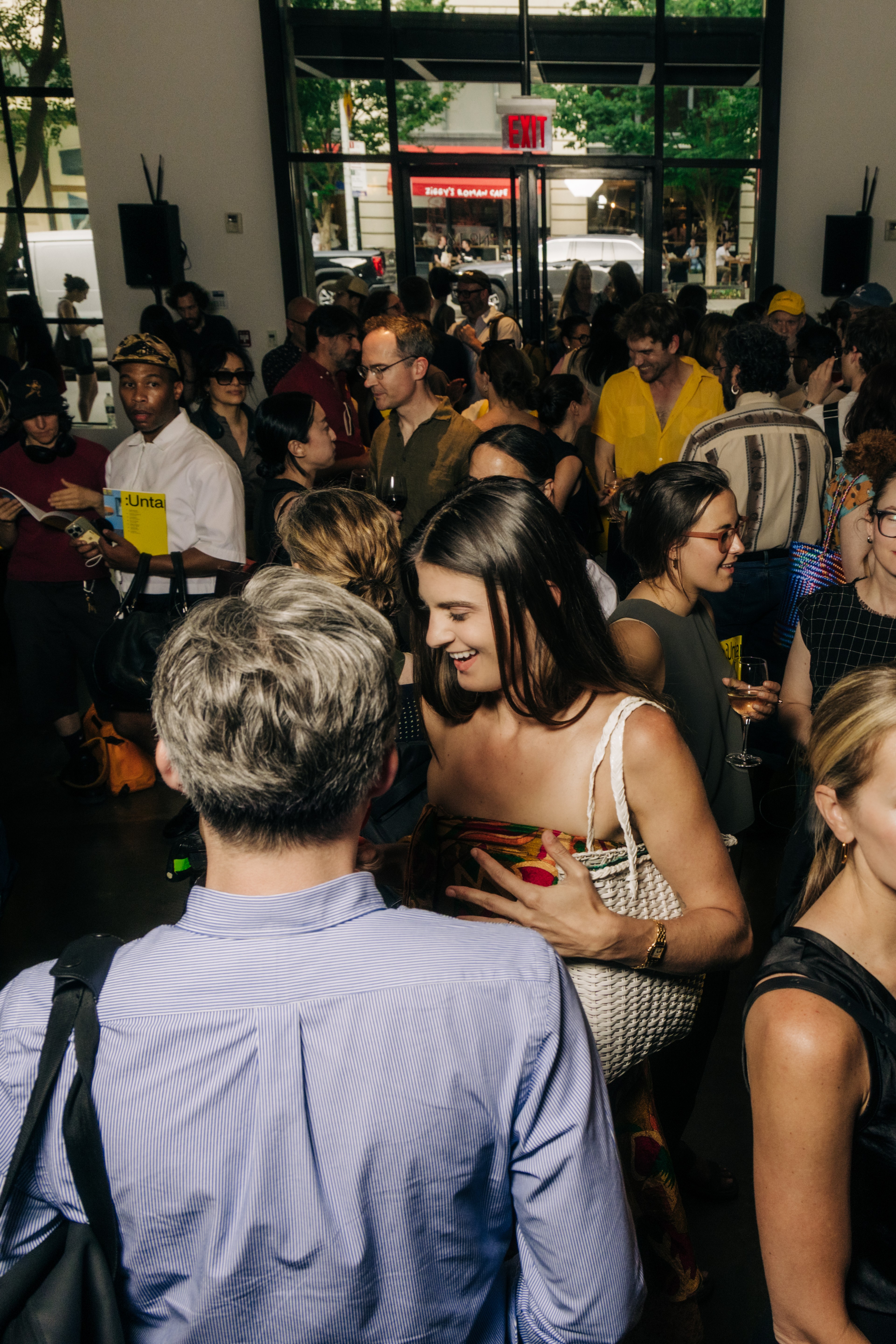 Large crowd socializing at Henrybuilt