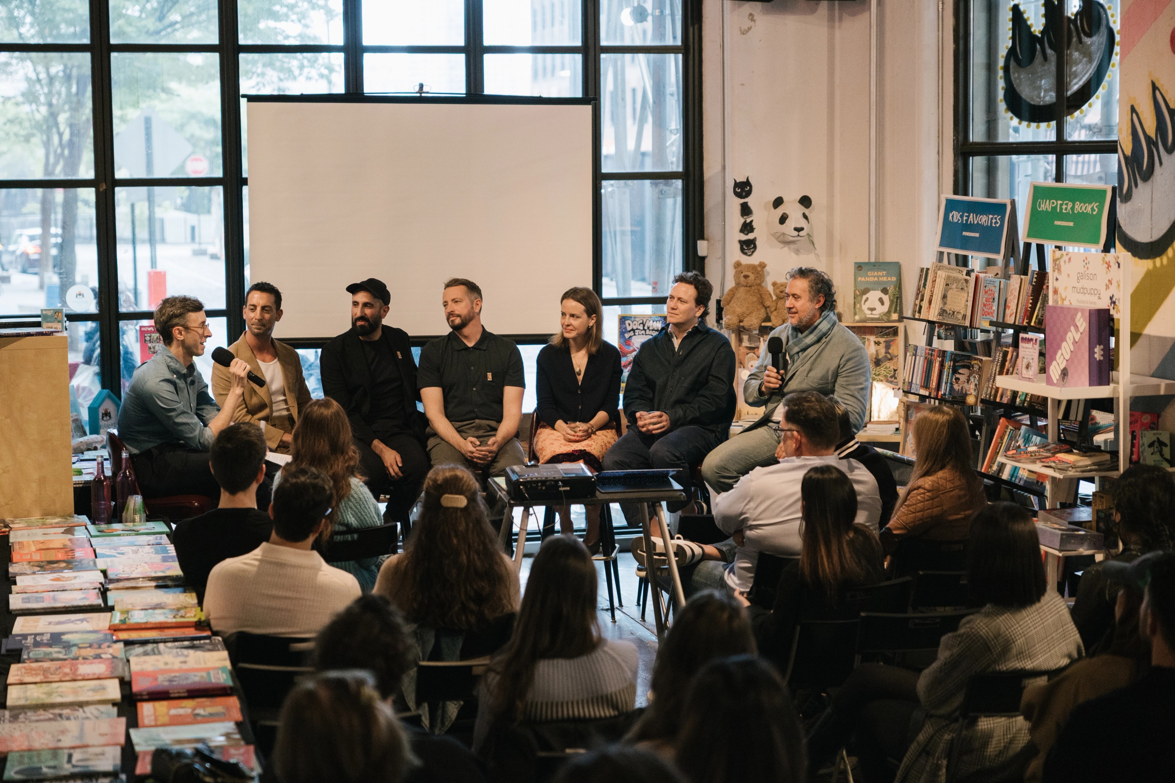 people speaking on a panel in a bookstore in DUMBO