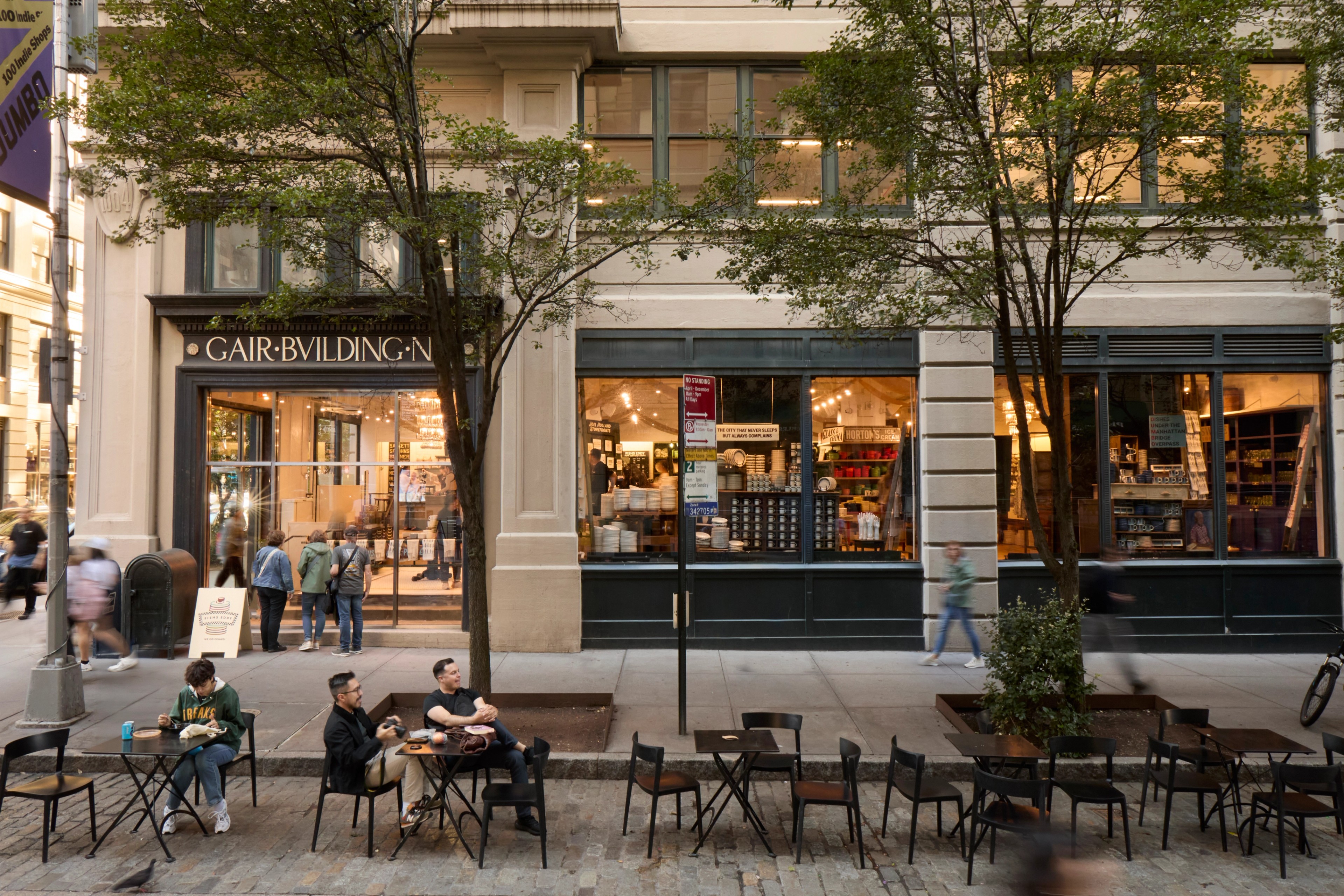 Exterior of 45 Main Street with cafe tables in the foreground