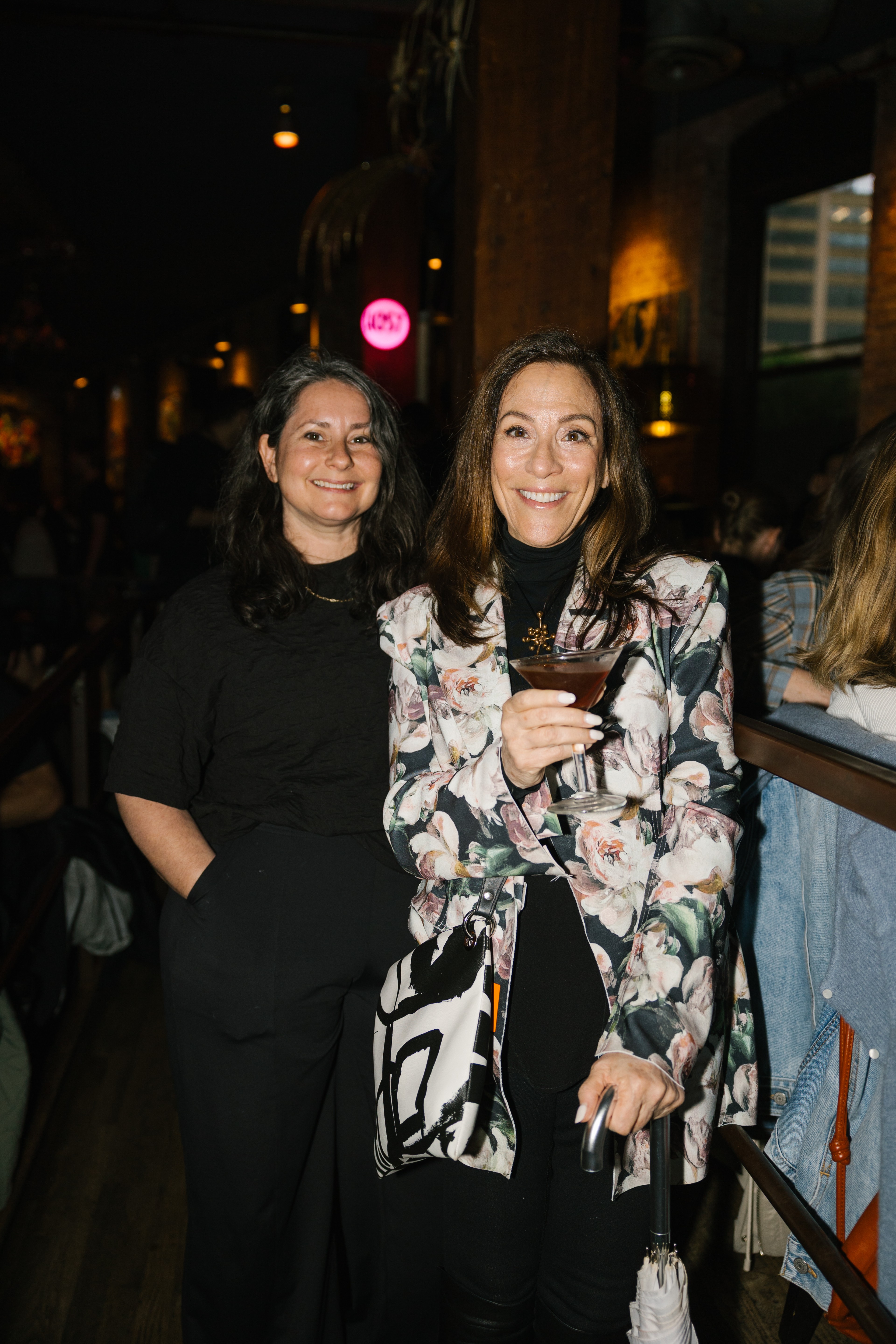 Party attendees pose for the camera