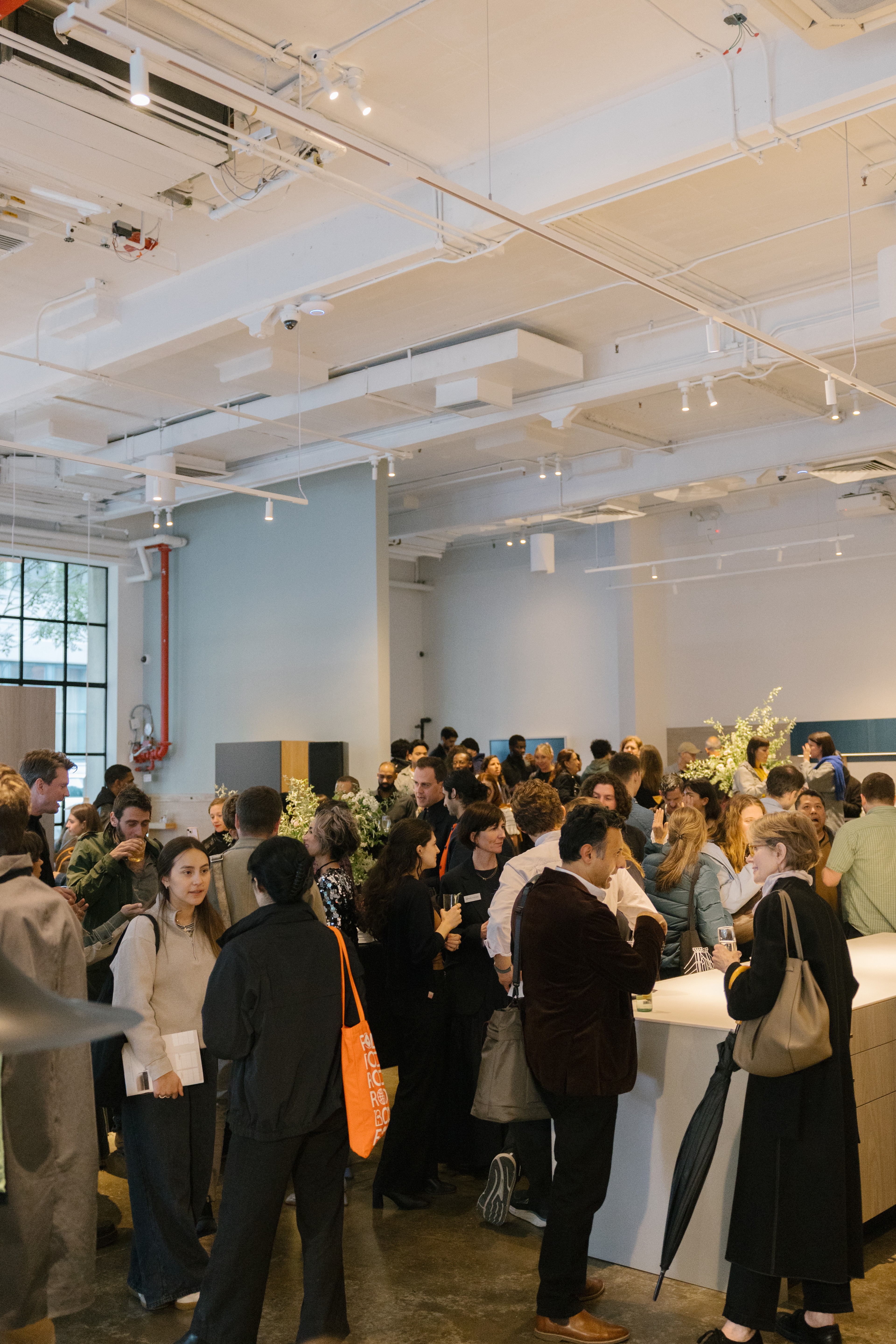 People standing at Henry Built party
