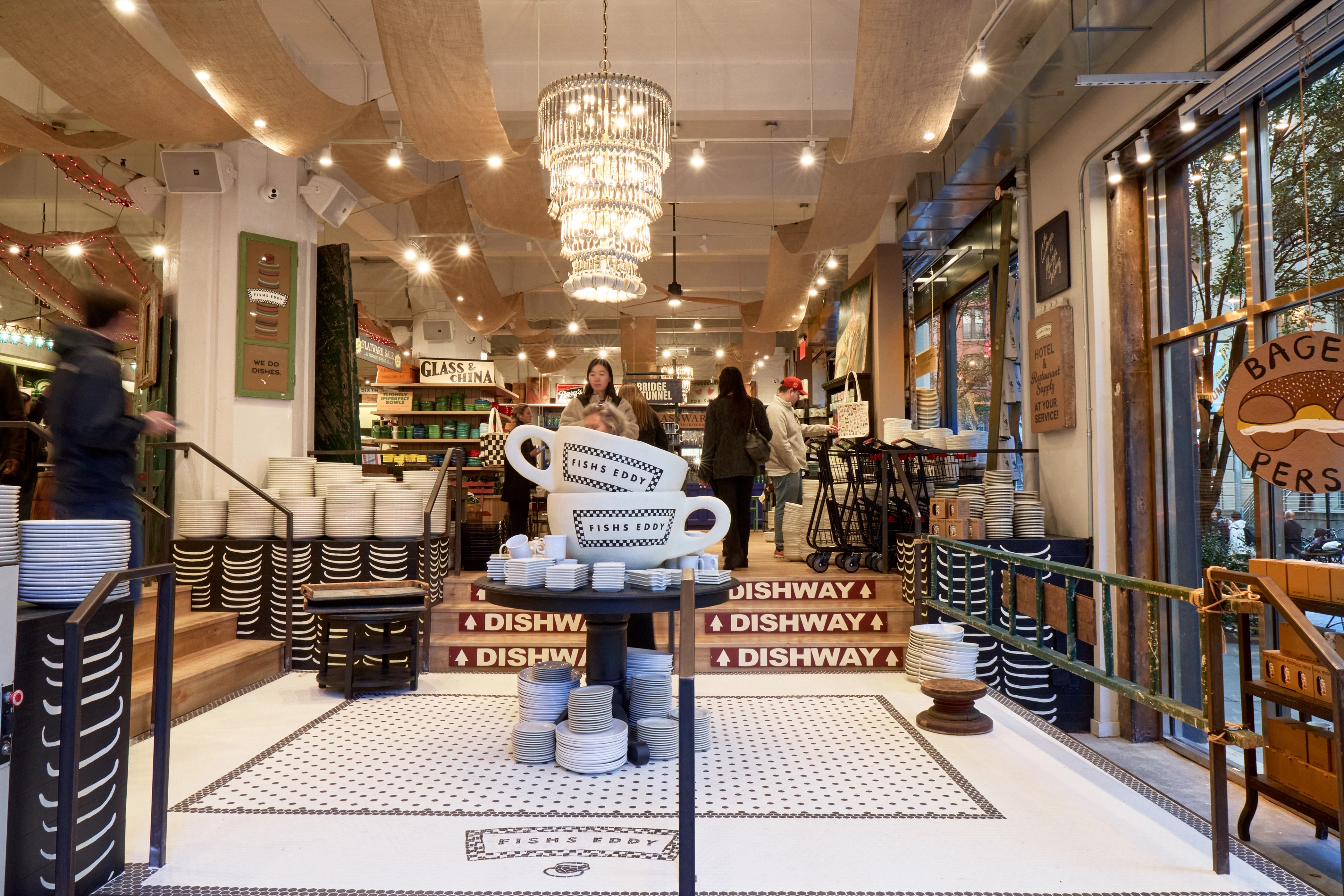 Interior of Fishs Eddy store featuring stacks of dishware