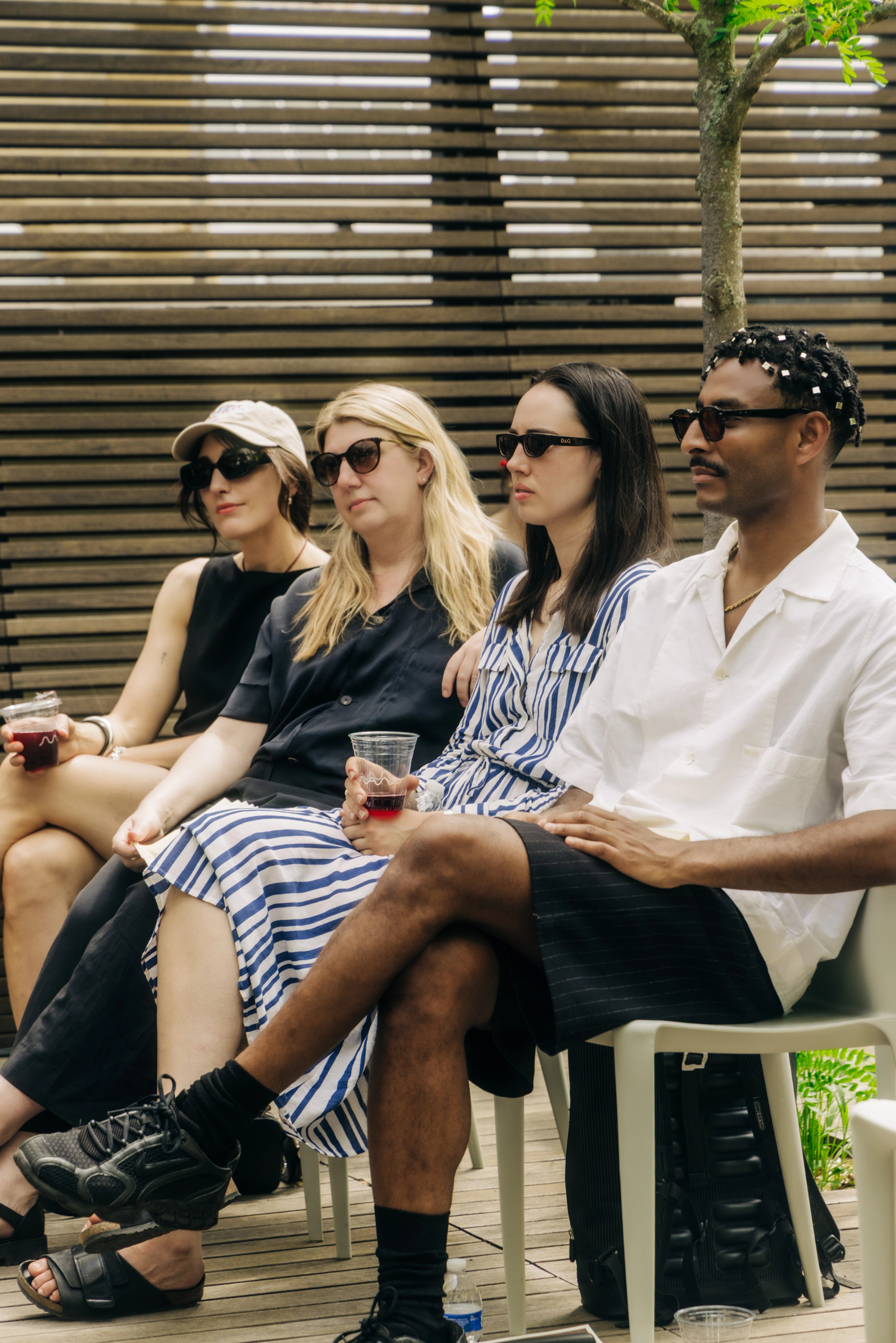 People seated at rooftop design talk