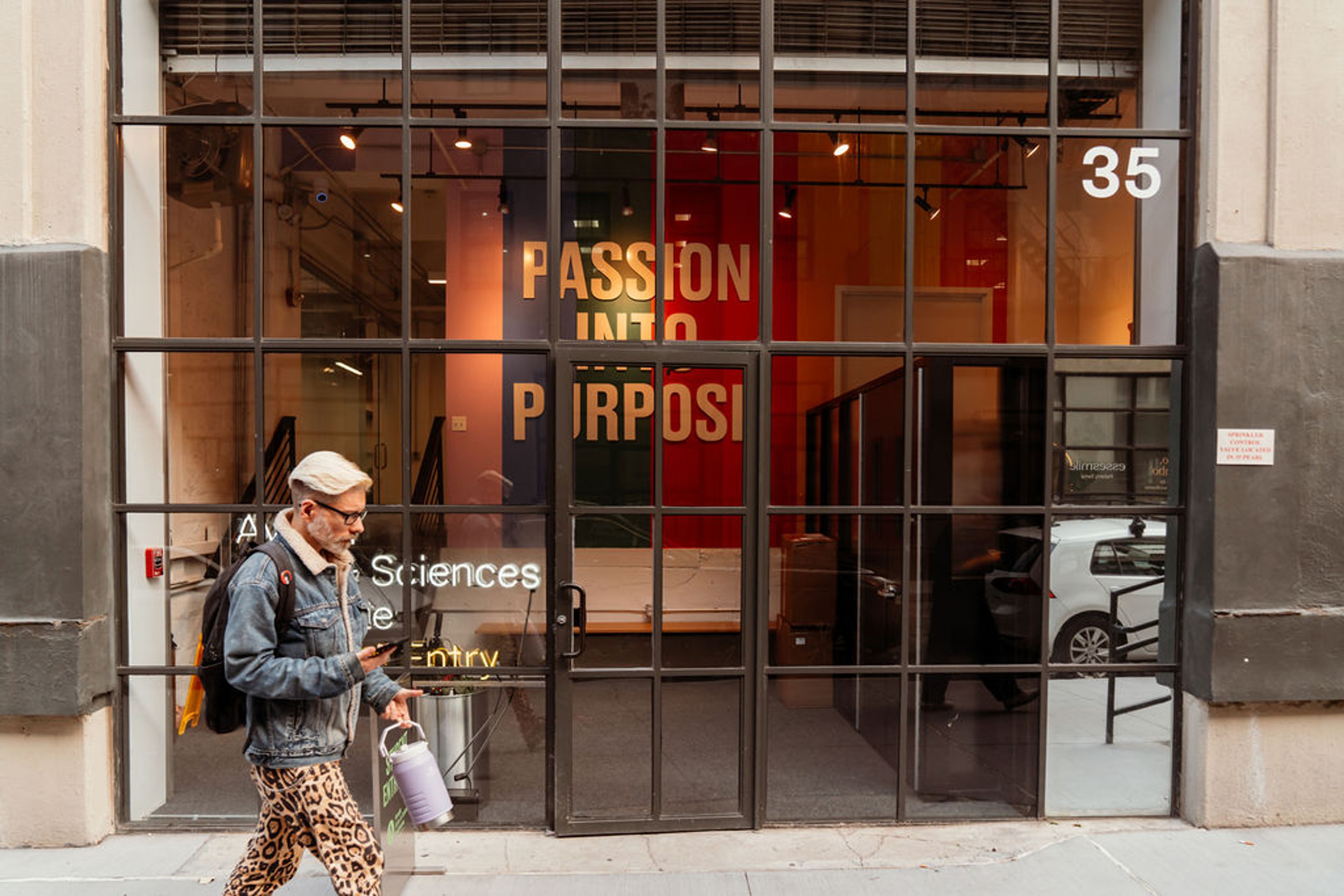 Photo looking from outside into windows of a retail space