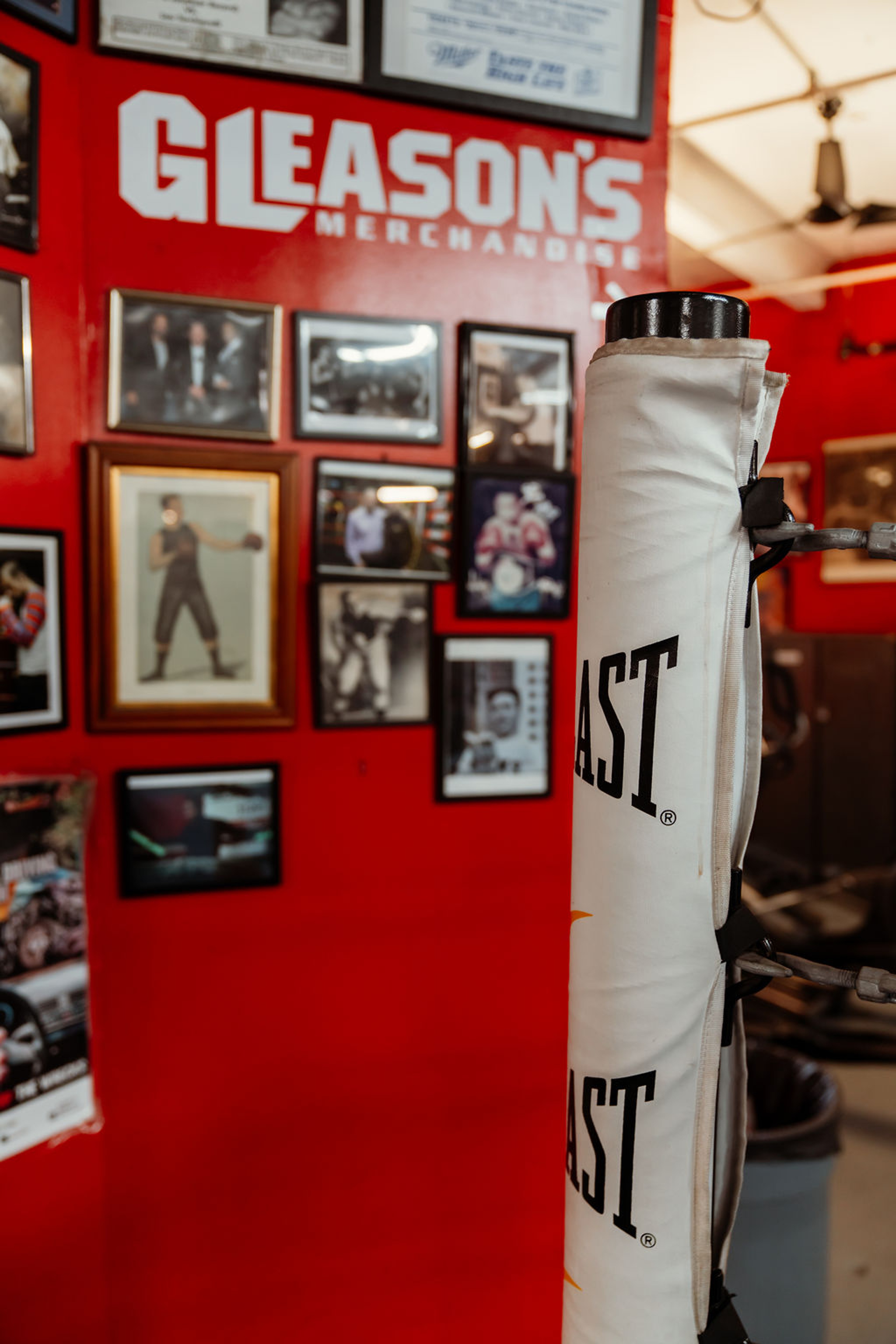 Interior wall of Gleason's Gym featuring framed photographs of Boxing Greats