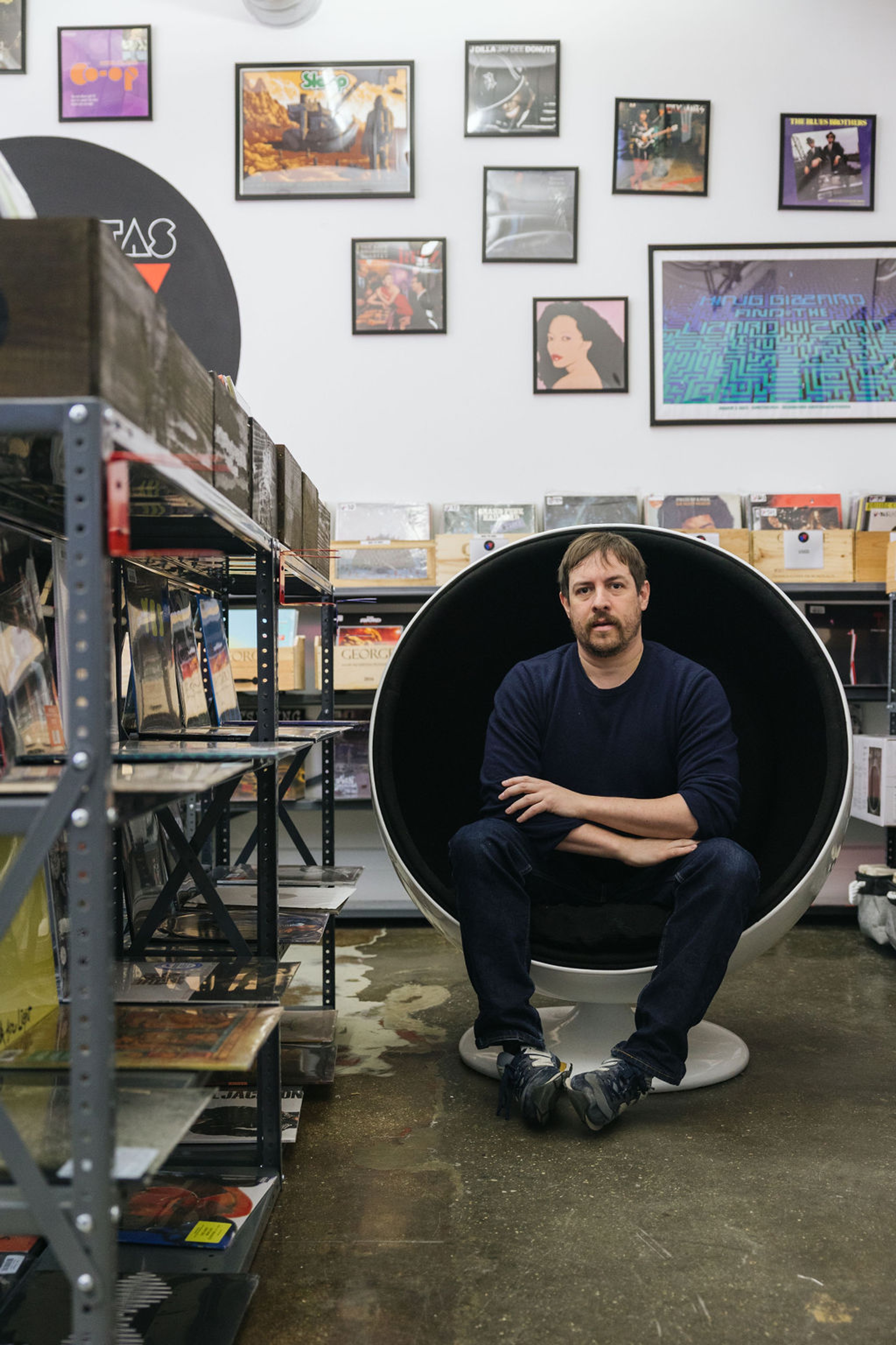 Vinyl Veritas owner Will Grandberg faces the camera