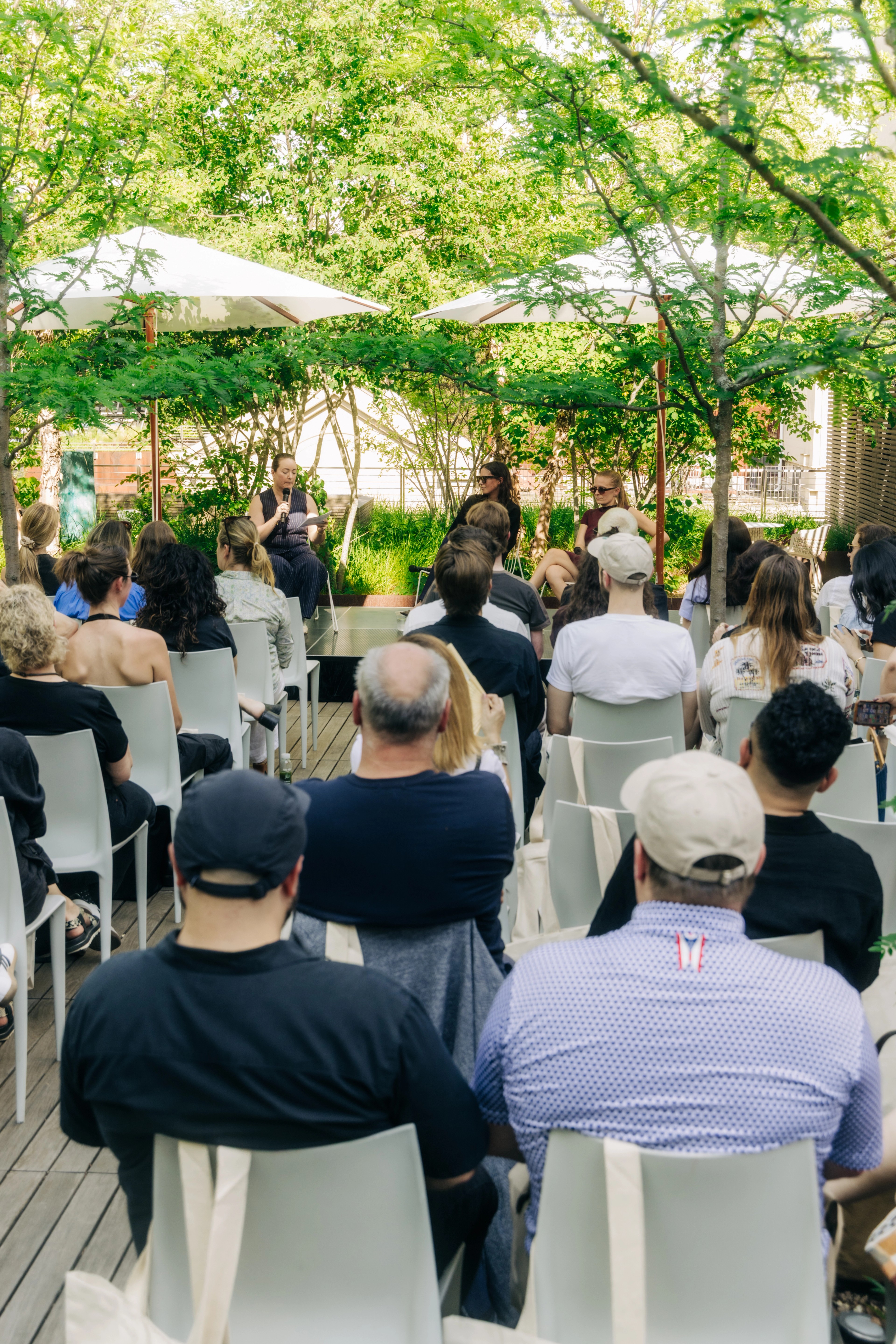 People seated at rooftop design talk