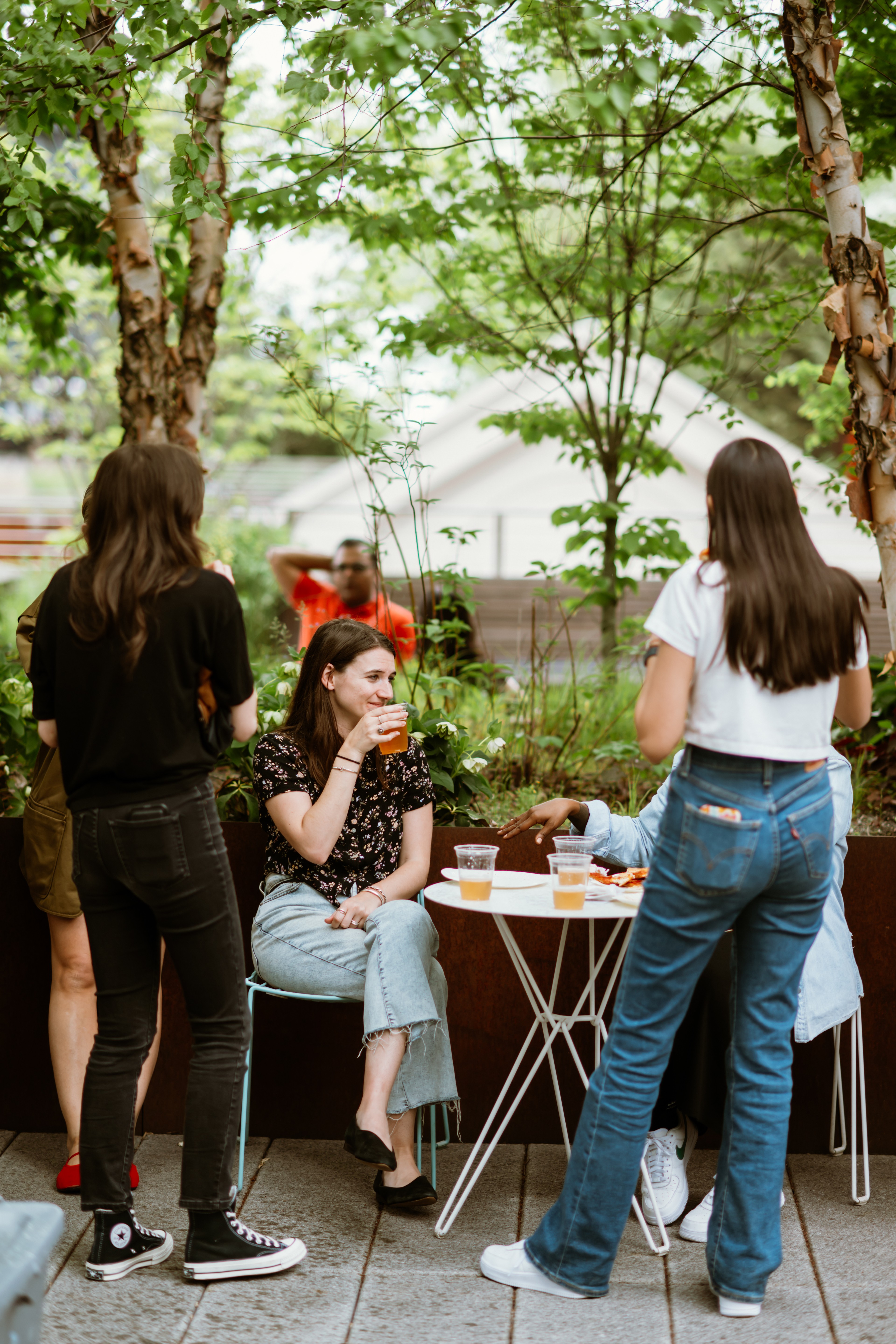 employees socializing on rooftop