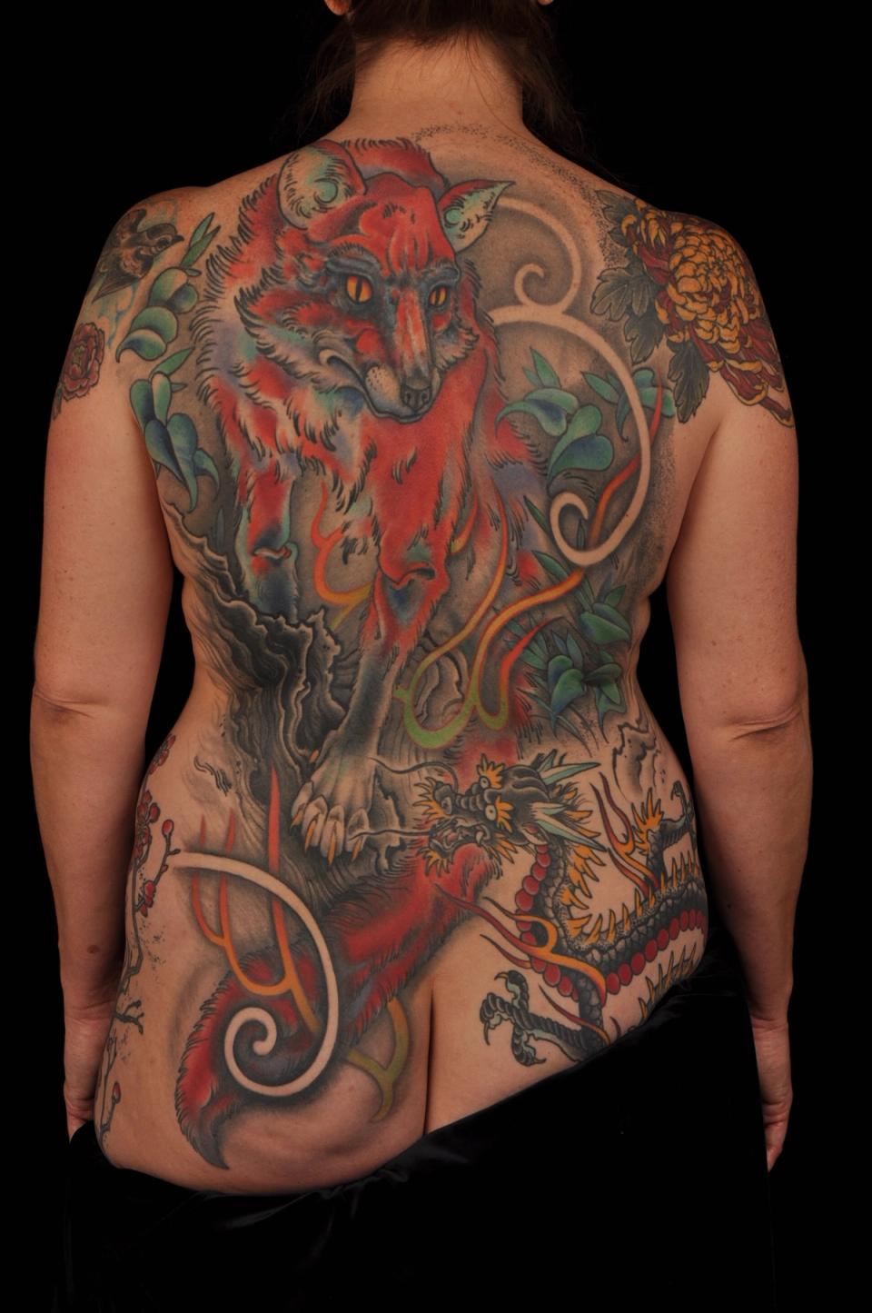 Fox back piece tattoo