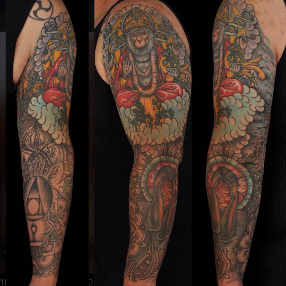 Monkey arm sleeve tattoo