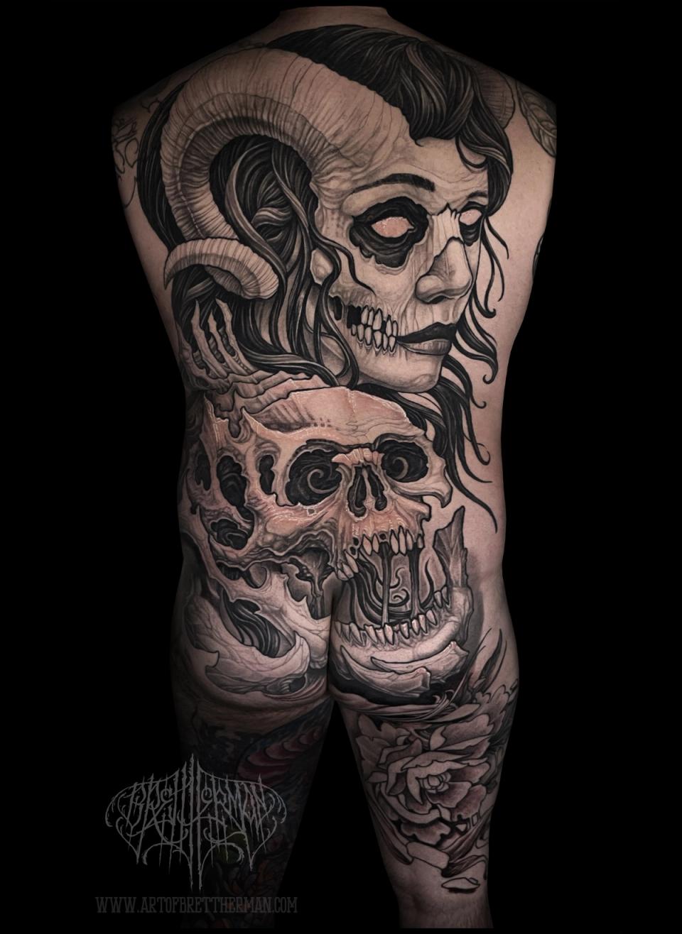 Dark Art back piece tattoo
