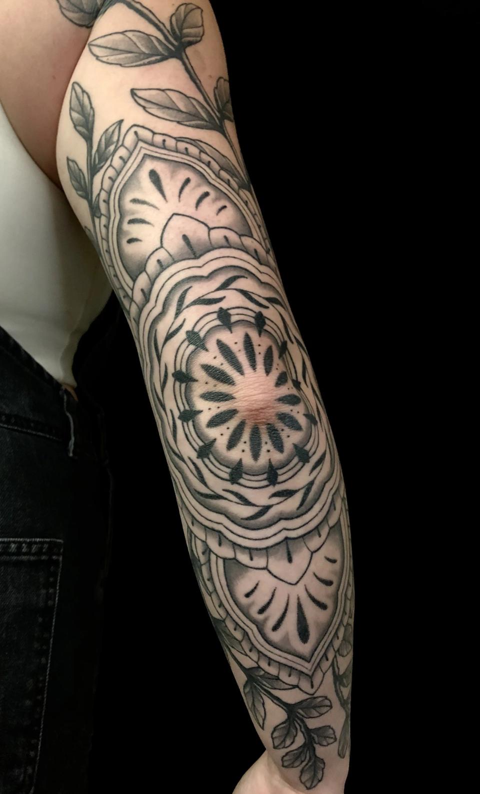 Decorative arm tattoo