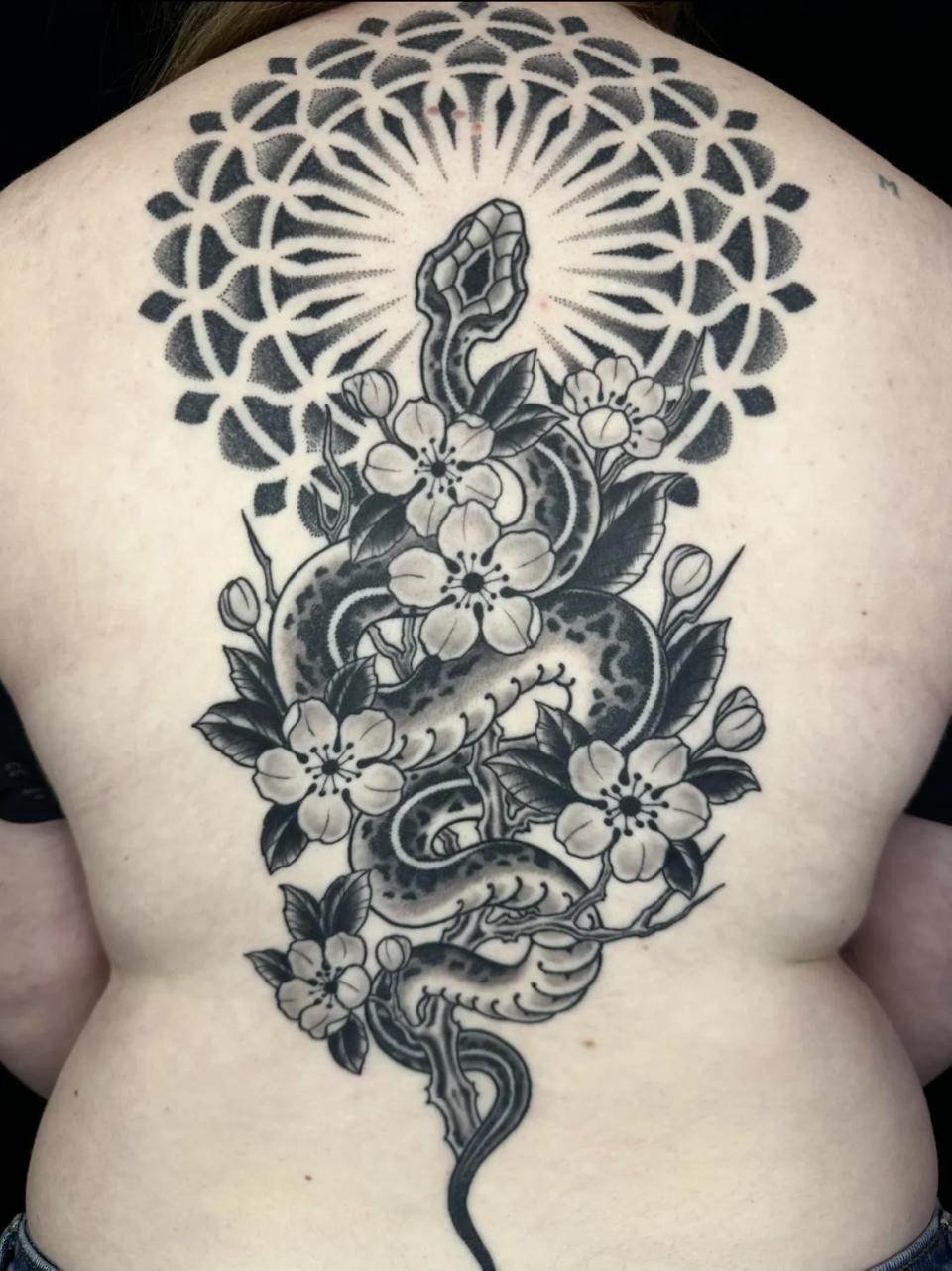 Snake back piece tattoo