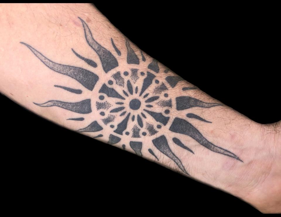 Sun design tattoo